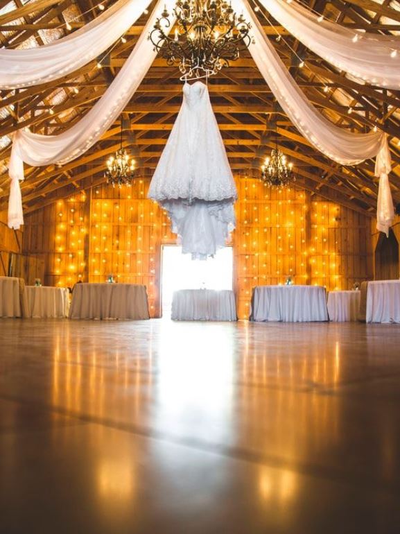 reception tables white gold lights