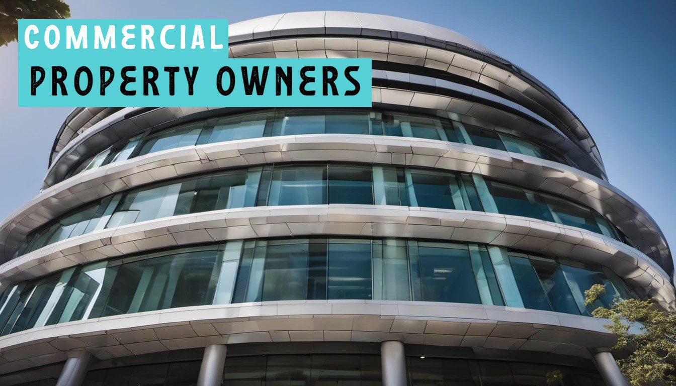 Modern curved commercial building with the text 'COMMERCIAL PROPERTY OWNERS' displayed.