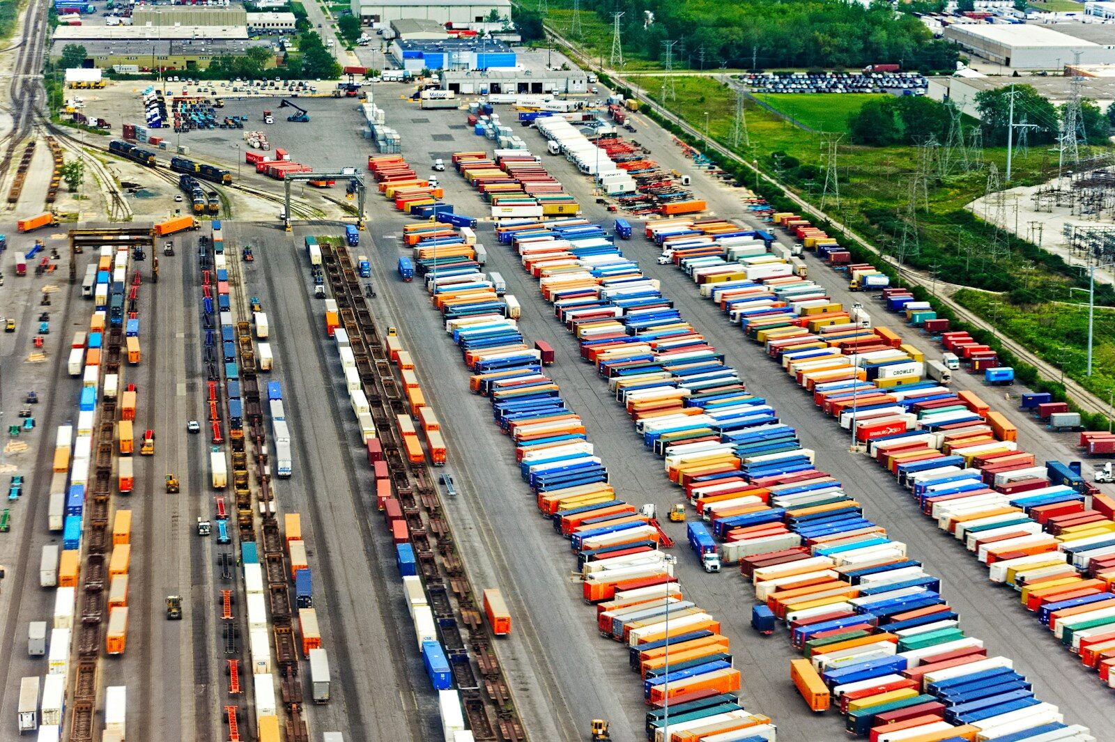 Commercial vehicles traveling as part of intermodal container transportation operations.
